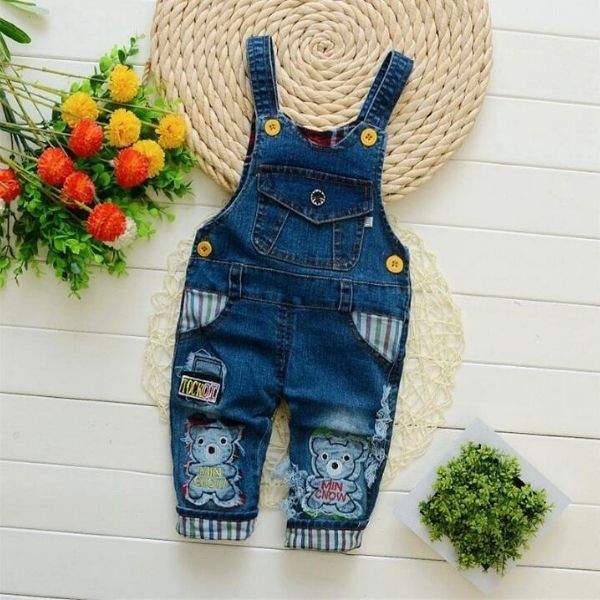 Macacão Jardineira Jeans  c/ Aplicações Pompom Bebê Menina | 9 Meses - 4 Anos-bebê menina,bebê menina 0-3 meses,bebê menina 0-4 anos,bebê menina 12-18 meses,bebê menina 3-6 meses,bebê menina 6-9 meses,bebê menina 9-12 meses,jardineira bebê menina,macacão bebê,macacão bebê algodão,macacão bebê estampado,macacão bebê menina,Macacão Jeans Bebê menina