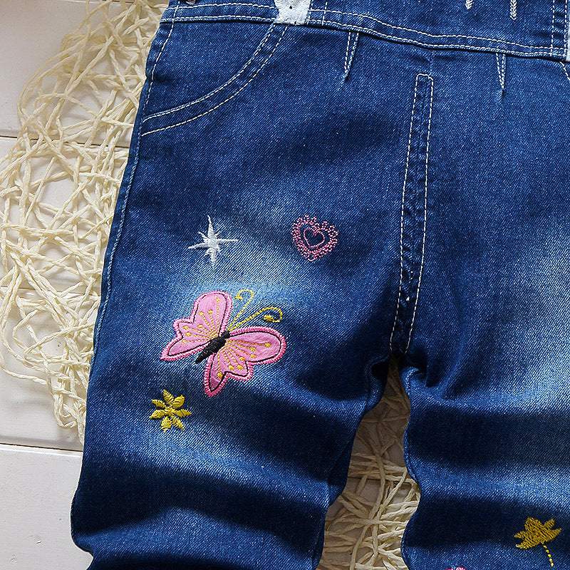 Macacão Jardineira Jeans  c/ Aplicações Pompom Bebê Menina | 9 Meses - 4 Anos-bebê menina,bebê menina 0-3 meses,bebê menina 0-4 anos,bebê menina 12-18 meses,bebê menina 3-6 meses,bebê menina 6-9 meses,bebê menina 9-12 meses,jardineira bebê menina,macacão bebê,macacão bebê algodão,macacão bebê estampado,macacão bebê menina,Macacão Jeans Bebê menina